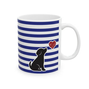 A white ceramic mug with a blue and white horizontal striped pattern, featuring a black silhouette of a sitting dog and a small red heart on the front.
