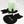 Oversized black cat coaster holding a white ceramic mug with green horizontal stripes and a black cat silhouette sits on a black cat-shaped coaster, with two additional black cat coasters in front on a white marble surface.