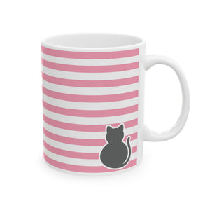A white ceramic mug with pink and white horizontal stripes, featuring a dark gray silhouette of a cat sitting on the lower right side, set against a plain white background.