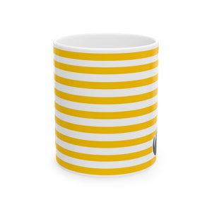 A white ceramic mug with bold yellow horizontal stripes, shown from a side angle on a clean white background.
