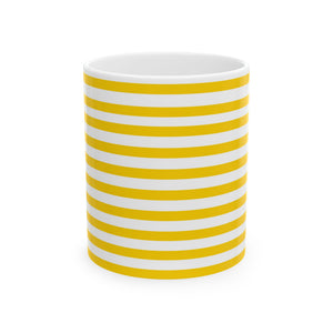 A white ceramic mug with bold yellow horizontal stripes, shown on a clean white background.