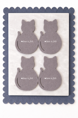 Cat Coasters – Wool Felt Set of 4  on a marble table