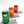 cat-shaped coasters holding soda cans with love is felt logo