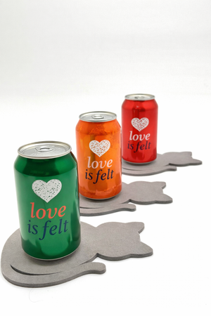 cat-shaped coasters holding soda cans with love is felt logo